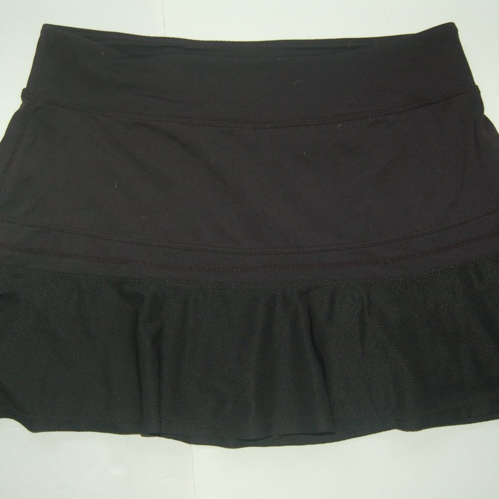 Kyodan woman's black golf skort, size P/S